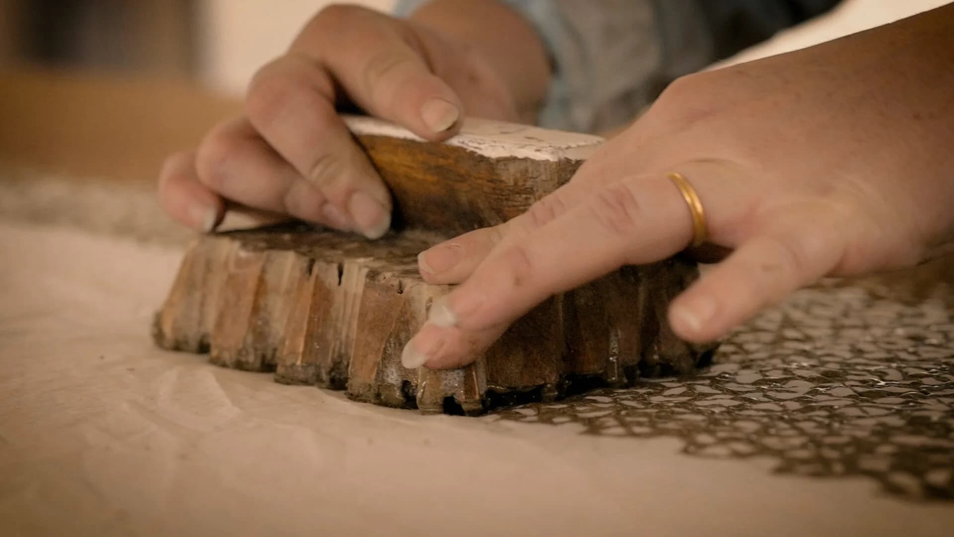 Artisan hands block printing